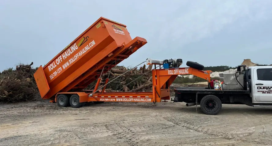 land grading clearing truck dumping on cleared land morriston fl